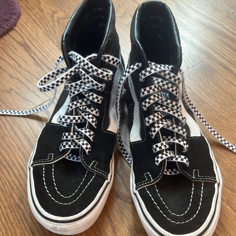 Black hightop vans checkered laces size 9.5 women’s barely worn.